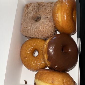 A pair of Family Donut donuts on a plate